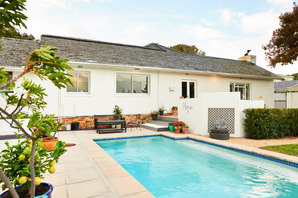 Swimming pool and patio in the backyard